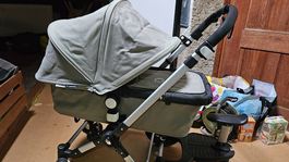 Poussette Bugaboo avec avec divers accessoires