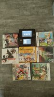 Nintendo 3DS mit Ladekabel und Spielen