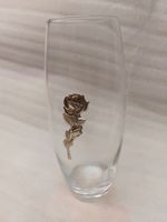 Glass vase with a rose design