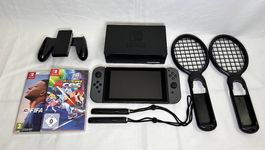Nintendo Switch | Accessori + 2 giochi + 128GB SD