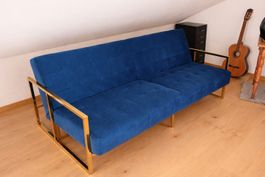 Blaues Schlafsofa mit Goldrahmen