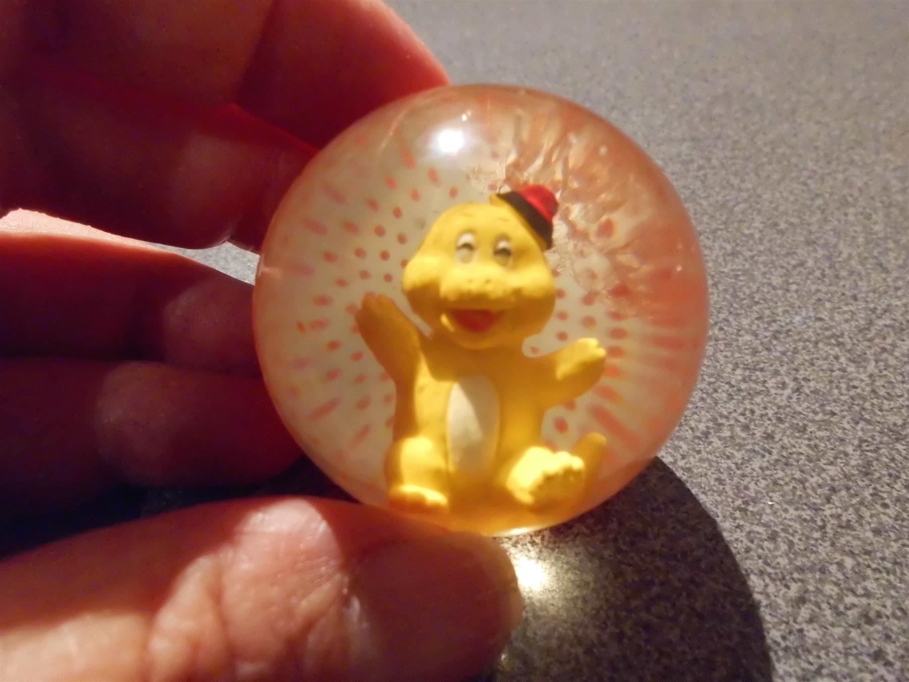 Giocattoli: Gummiball mit gelbchen Tierchen, orange – Usato da Zürich venduto da abraxas1291