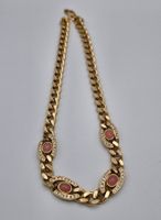 Vergoldete Kette mit rosa Steinen,