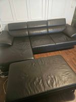 Sofa mit Hocker