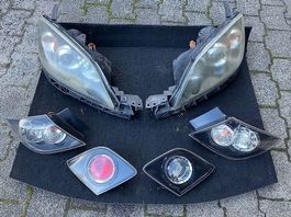 Frontscheinwerfer / Rücklichter: Mazda 3 (2003-2009)