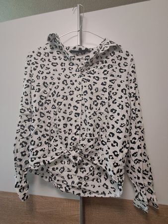 Chemisier femme motif léopard blanc et noir
