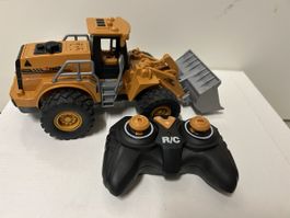 RC Bagger gelb mit Fernsteuerung neuwertig 