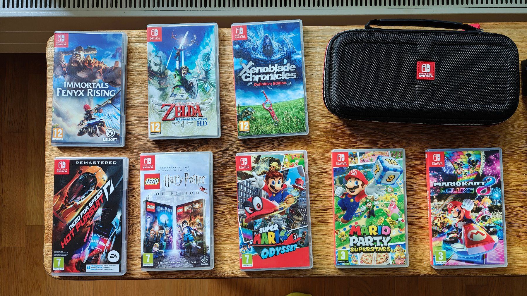 Nintendo Consoles: Nintendo Switch Bundle – 8 Spiele, Pro Controller, 4 Joy-Con – D'occasion à Zürich par chensey 4
