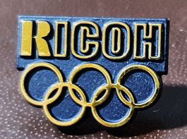 T148 - Pin Olympiade Sponsor RICOH