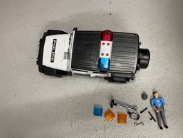 Polizeiauto mit Sirene und Blaulicht
