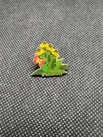 Anstecker Ricola Blumen Motiv