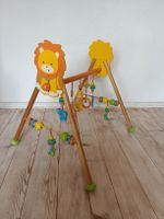 Spielbogen aus Holz mit Löwenmotiv