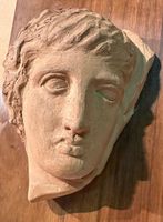 Unique Clay Sculpture of a Woman's Face - Wall Hanging