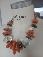 Statement-Kette mit orangen und transparenten Elementen