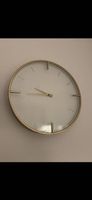 Goldene Wanduhr