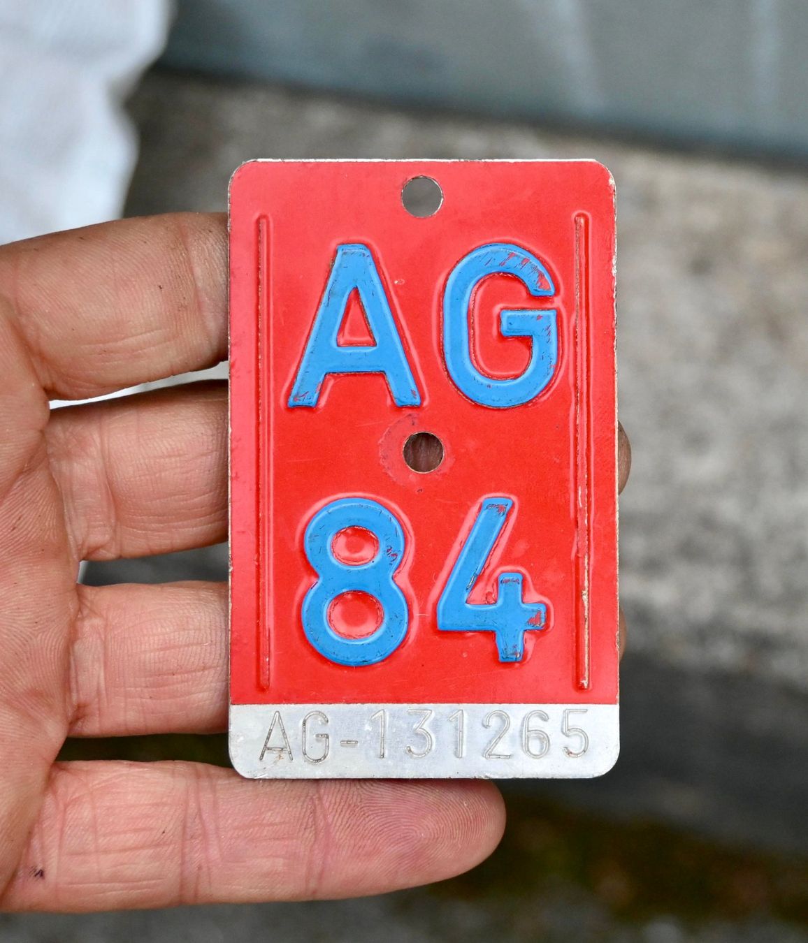 Insegne: Velonummer AG 84 von 1984 - Aargau – Usato da Pfaffhausen venduto da mono_rec 1