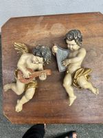Cherubenengel, aus geschnitztem und handbemaltem Holz im