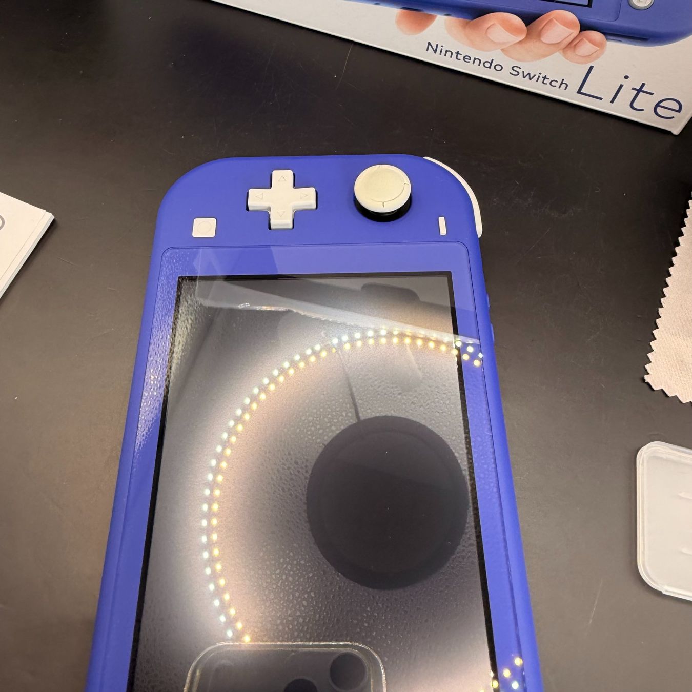 Nintendo Konsolen: Nintendo Switch Lite Blau – Gebraucht aus Düdingen von Nerdworld 4