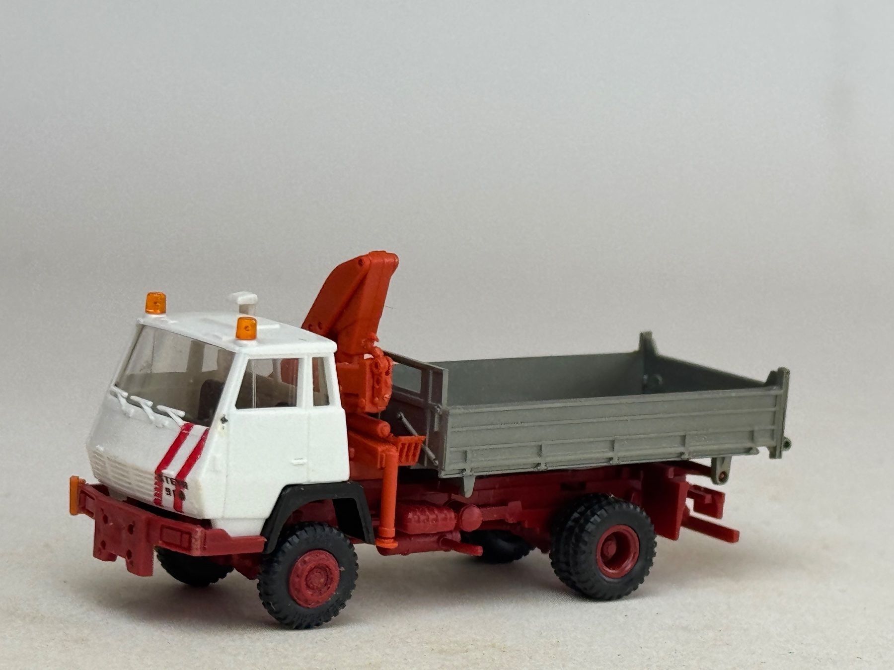 Steyr Modellini d'auto: VE1- Roco Steyr Pritschen Kipper mit Ladekran – Usato da Elm venduto da Wikmtz