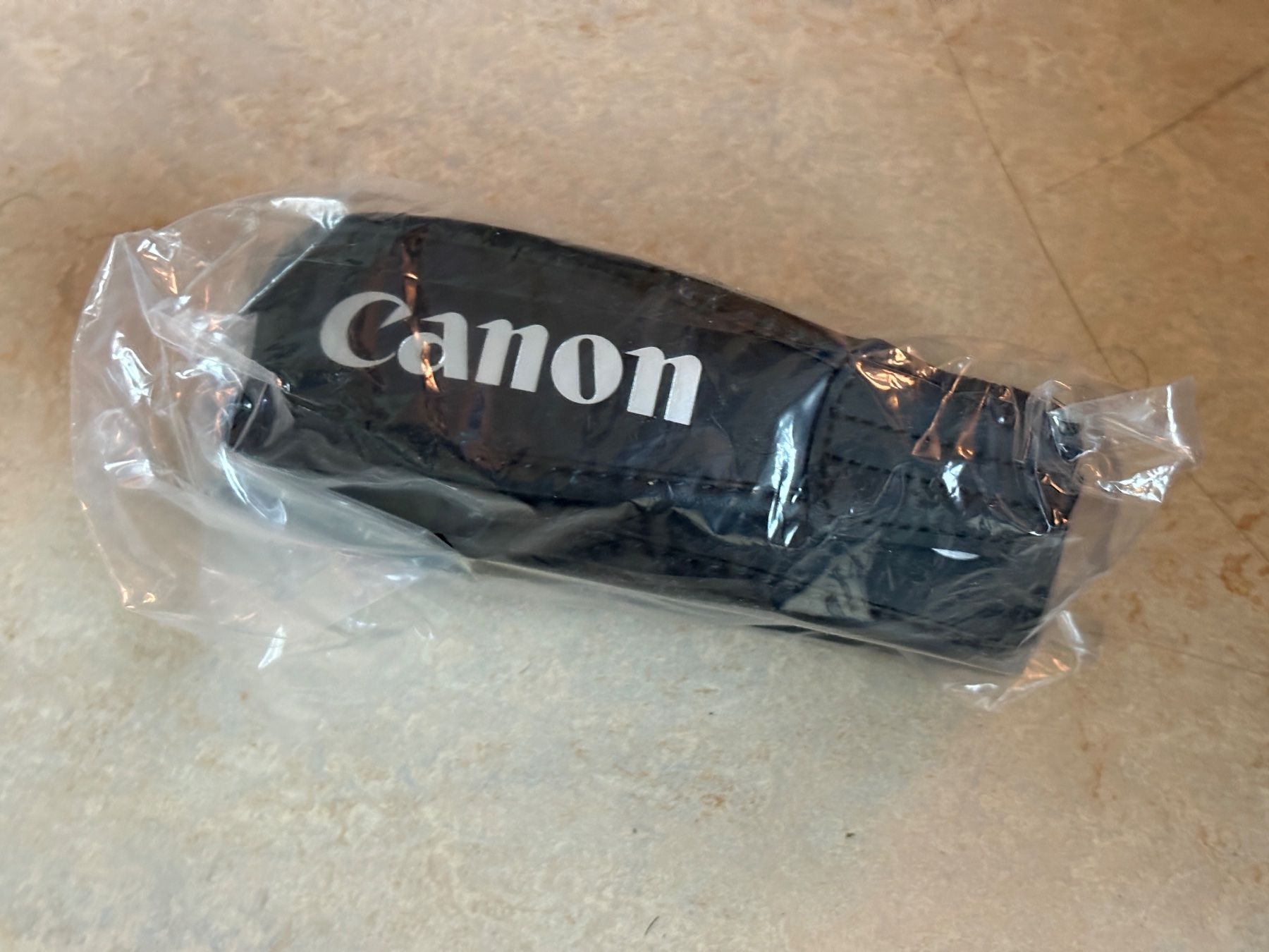 Canon Altri Accessori: Canon Kameragurt schwarz – Usato da Dietikon venduto da The-Star-Shop