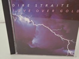 CD Dire Straits - Love Over Gold