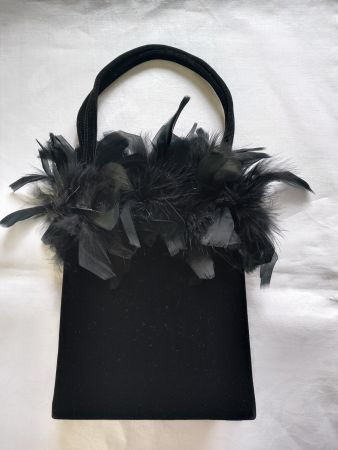 Sac à main neuf à plumes, velours