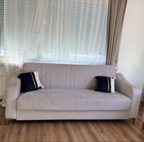 Beige graue sofa mit Schlaffunktion