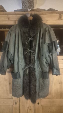 Veste en cuir et fourrure gris taille unique bon état