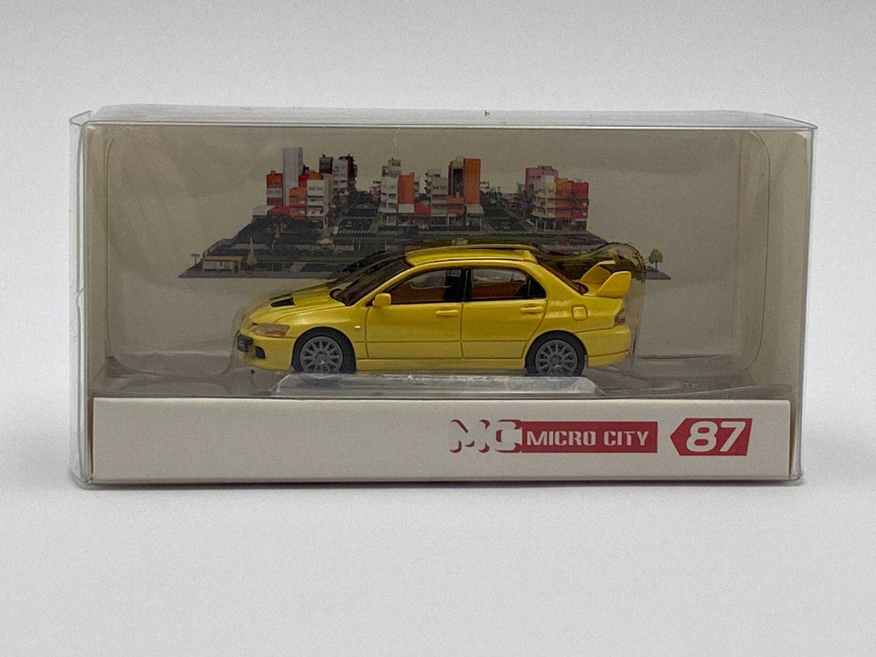 Mitsubishi Modellini d'auto: Herpa 87MC000004 1:87 Mitsubishi Lancer Evolution 9 gelb – Nuovo e nell'imballaggio originale da Neukirch a.d. Thur venduto da MoBa-Artikel.ch 3