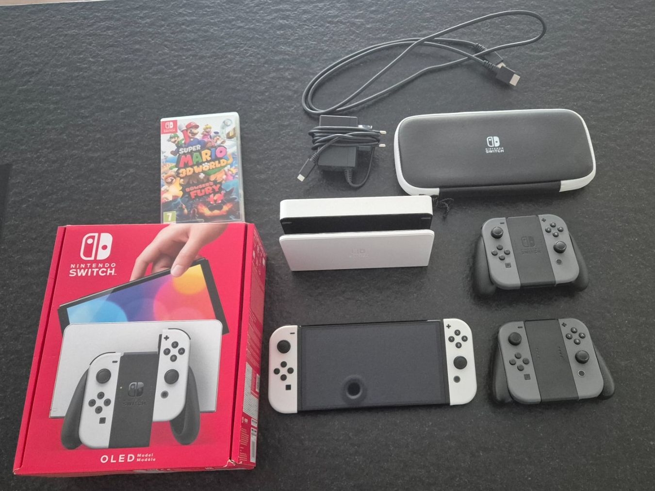 Nintendo Konsolen: Neuwertig: Nintendo Switch OLED Weiss+2 Controller+3D Mario – Neu (gemäss Beschreibung) aus Zeiningen von McEddie_1297