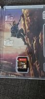 Nintendo Switch OLED + 3 jeux (2 Zelda + Mario)