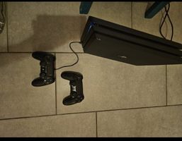Console de jeu PlayStation 4 Pro + 2 manettes + cable alim