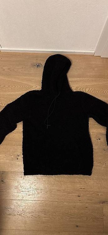 schwarzee flauschiger Hoddie unisex 1