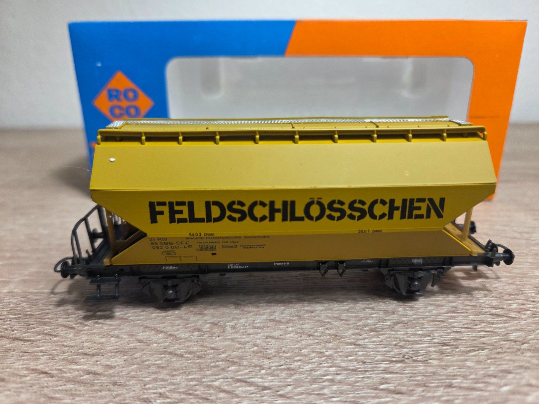 Roco Modellini di ferrovie: Roco 44314C Silowagen Feldschlösschen SBB H0 – Nuovo e nell'imballaggio originale da St-Aubin-Sauges venduto da Lo_Go 1