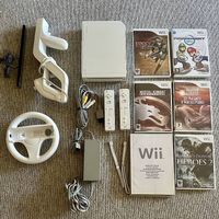Nintendo Wii complète + 5 jeux + accessoires