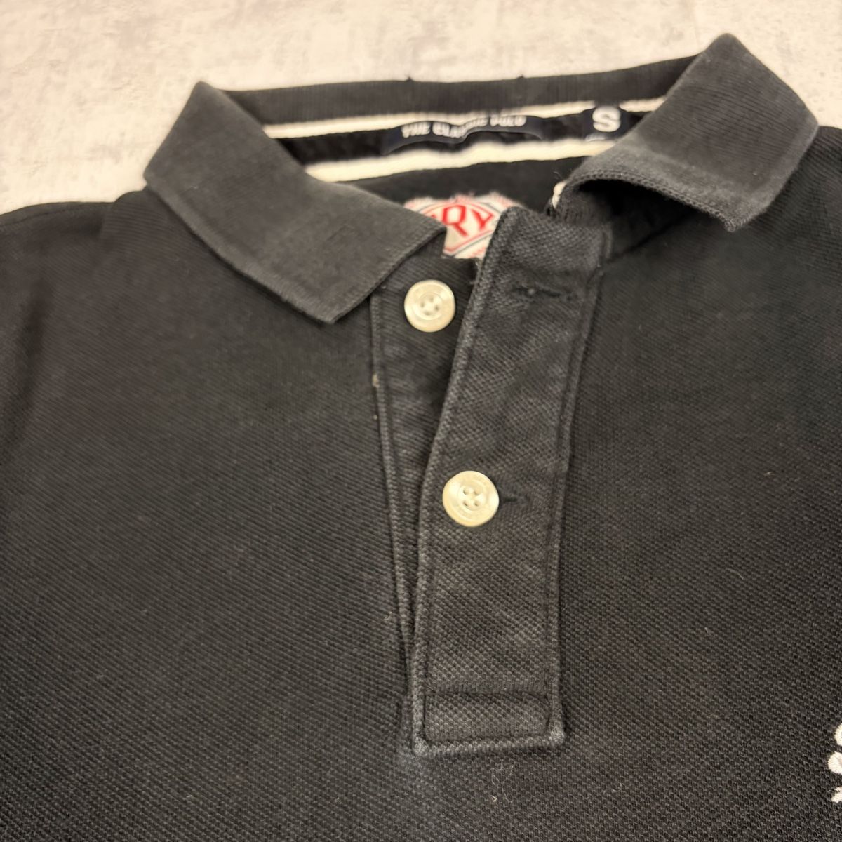 Superdry Magliette Polo: Polo SuperDry noir - Taille S  – Nuovo (secondo la descrizione) da Neuchâtel venduto da aliceguins 4