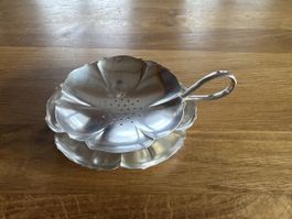 Silbernes Teeabtropfset