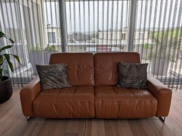 Ledersofa mit Relaxfunktion, braun / cognac