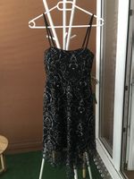 Robe noire à bretelles, motifs argentés, taille M