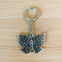 Schlüsselanhänger mit Schmetterling Motiv