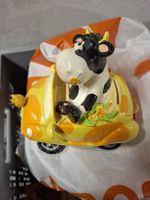 Witziges Kuh Spardöschen im Auto