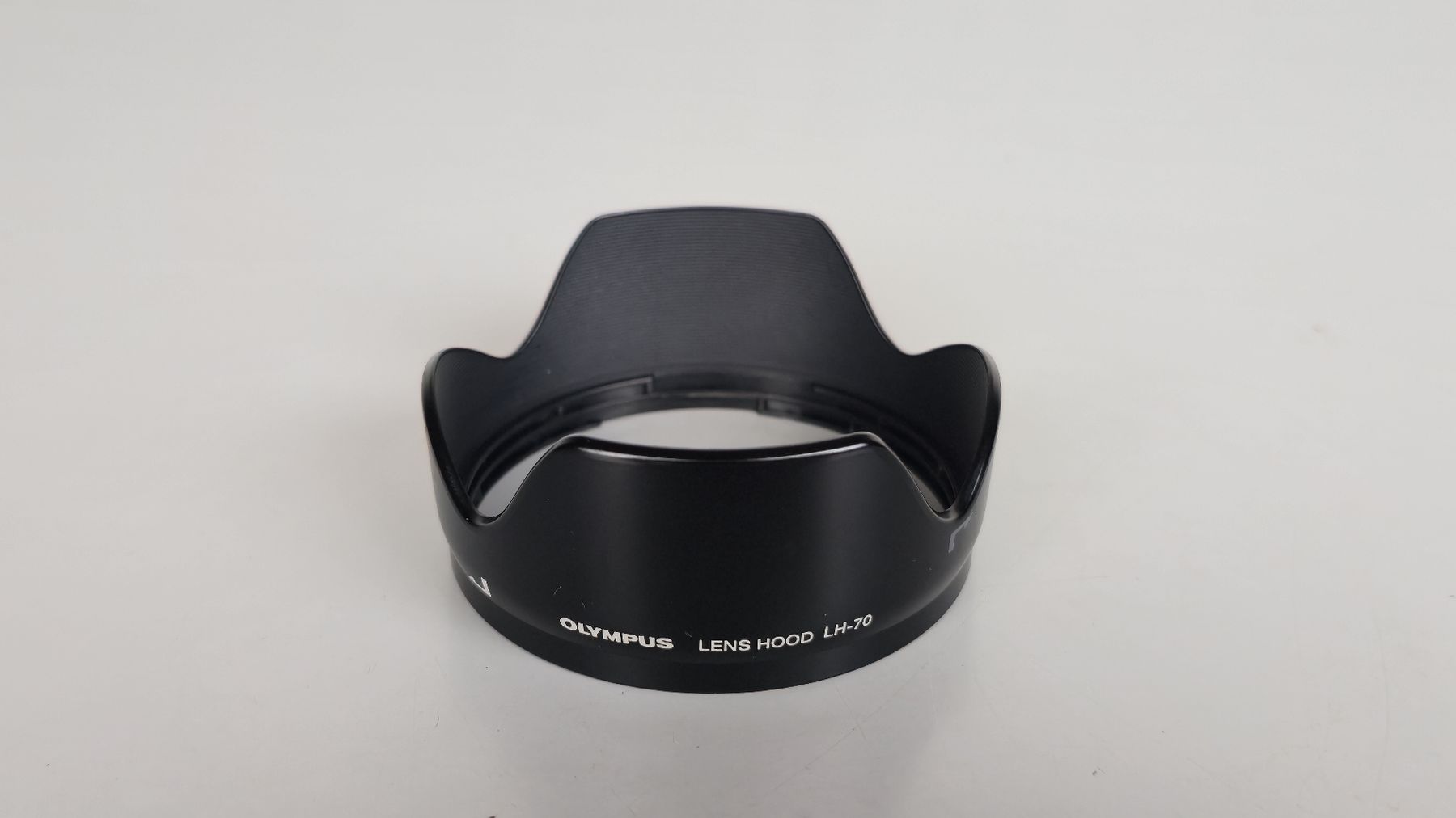 Olympus Objectifs: Olympus Sonnenblende LH-70 – D'occasion à Arbon par Evathefirst