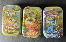 3x Pokemon Prismatic Evolution Mini Tin English
