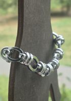 Bracciale in acciaio inossidabile con maglie ovali e nodi