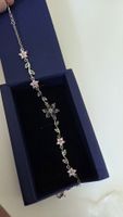 Armband Blumen Motiv rosa Steine grün Blätter silberfarben
