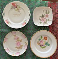 Vier Zierteller mit Blumenmotiven
