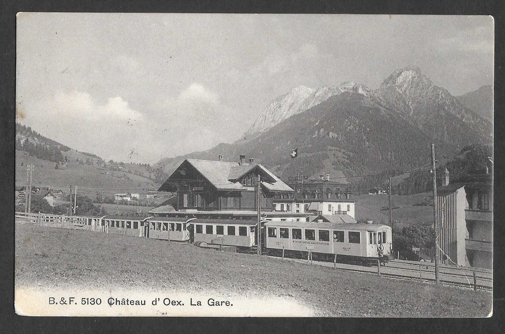 Cartoline postali: Château - d'Oex Bahnhof mit Zug – Usato da Olten venduto da clotaldi