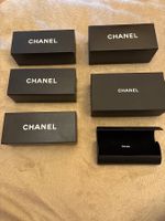 boîtes Chanel vides et etui lunettes Prada