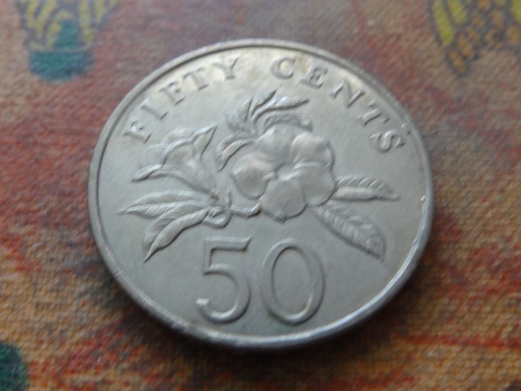 Tutti le monete: SINGAPOUR  50  Cents  1995 – Usato da Romanel-sur-Lausanne venduto da Swift13