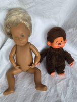 Sasha-Puppe und Monchhichi-Puppe